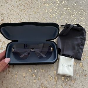 Never worn Gucci sunglasses with case and accessories